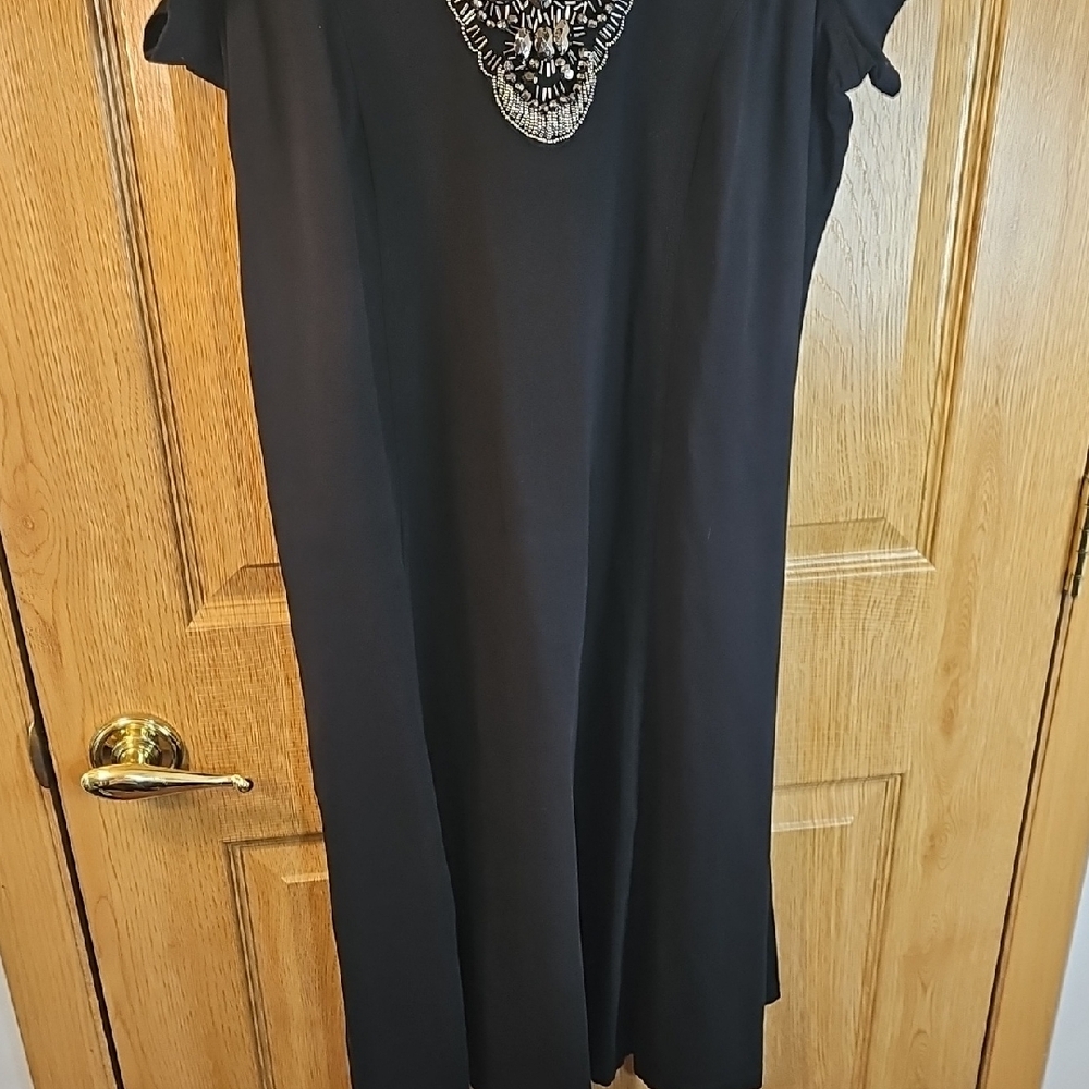 Chic Black Mini Dress with Embellished Neckline - Picture 6 of 10